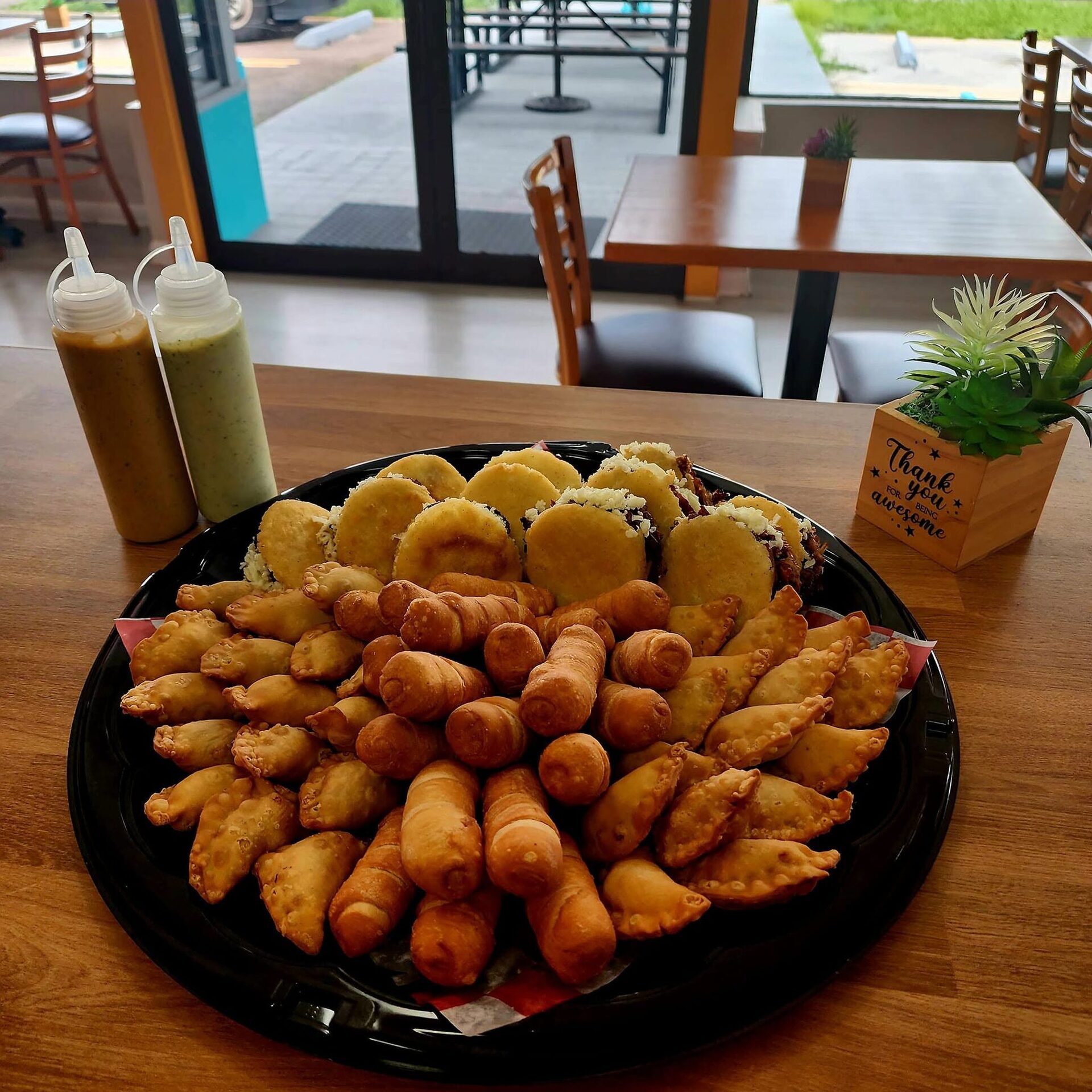 Mixed party platter of empanadas, tequeños and mini arepas